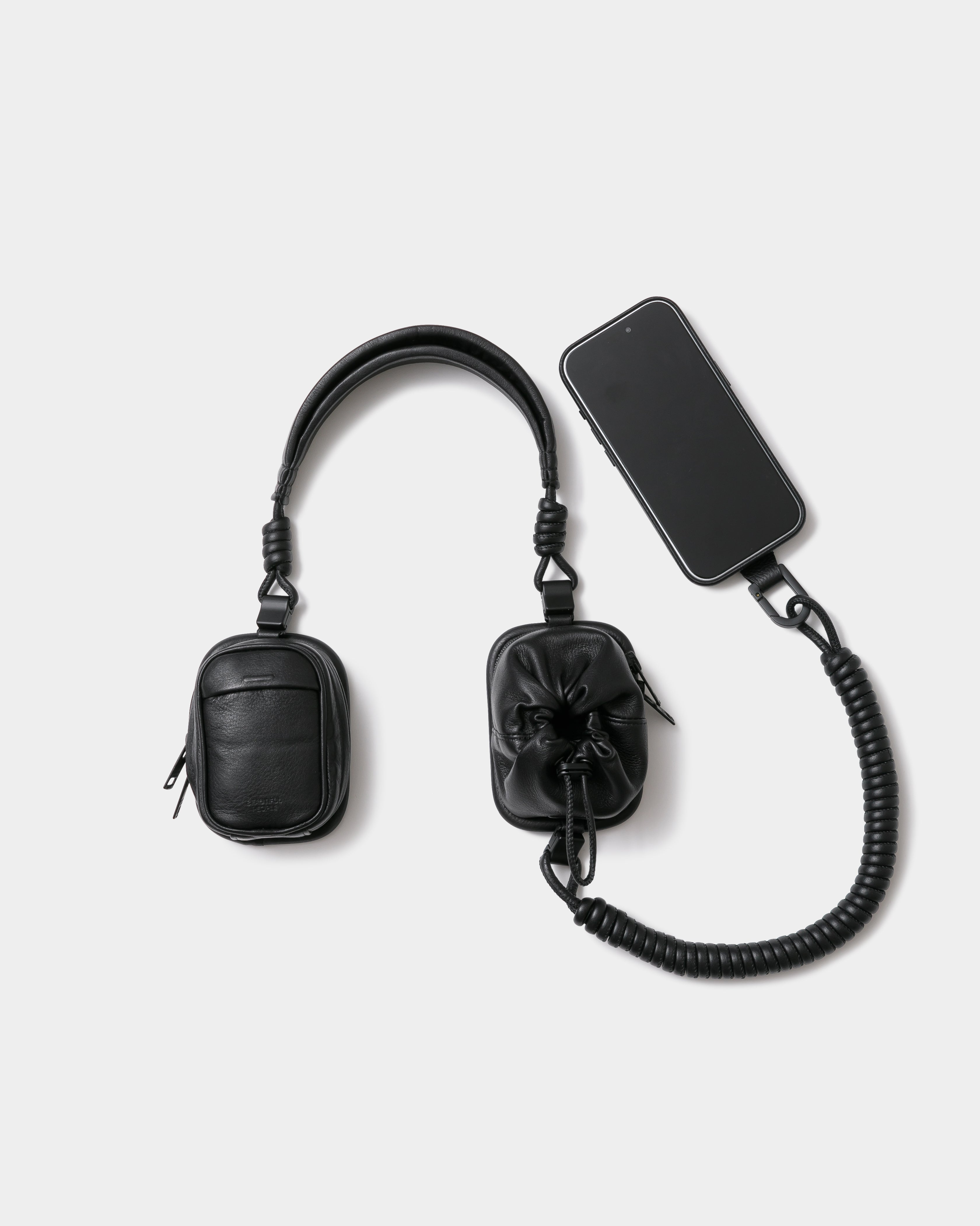 objcts.io MagWear headphone leather purse – beautiful people